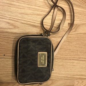 Small MK crossbody purse.